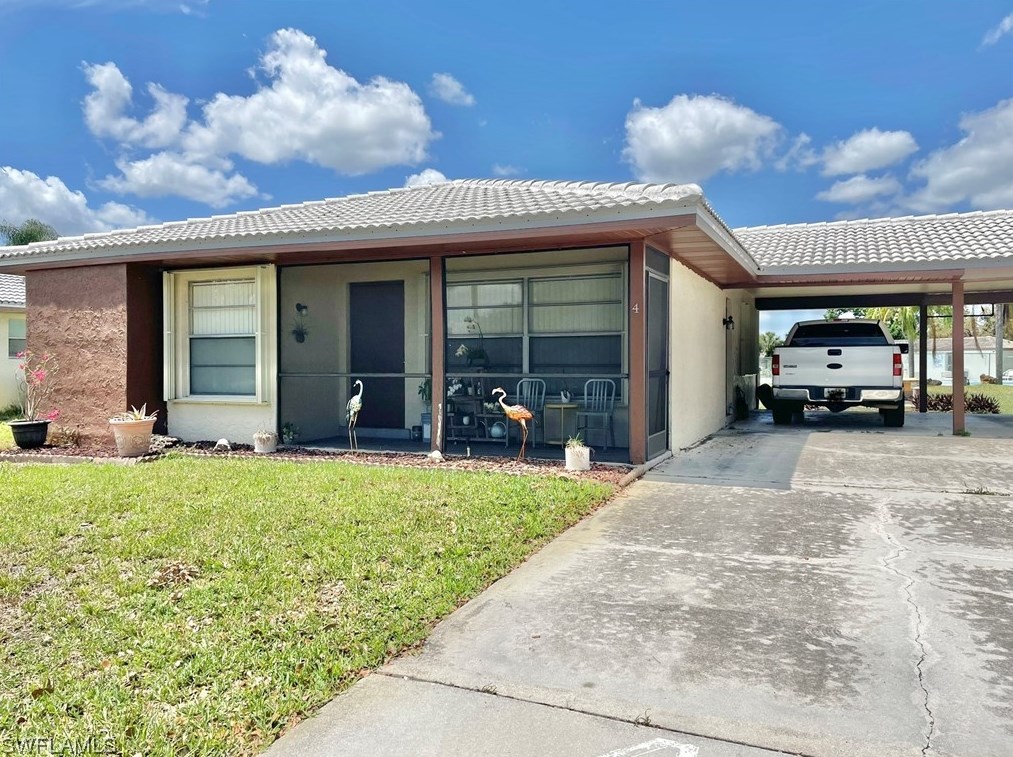 4 Parkwood Villas Ct, Lehigh Acres, FL 33936