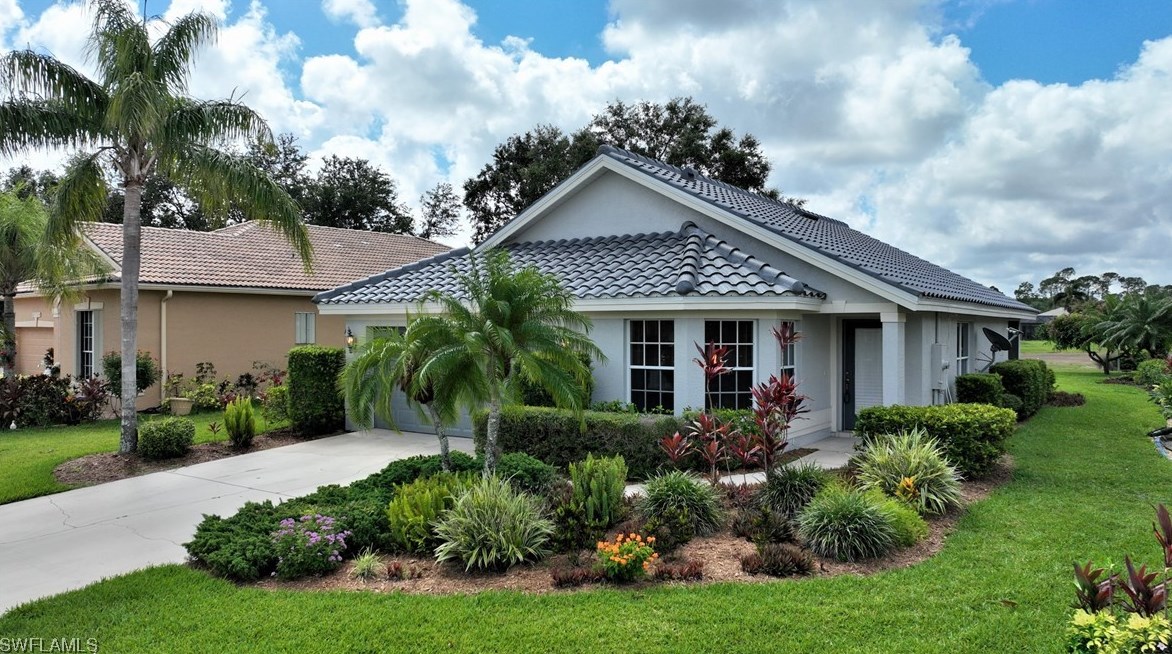 2100 Oxford Ridge Cir, Lehigh Acres, FL 33973