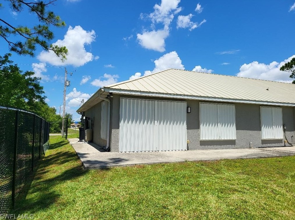 387 Carrillon Ave S, Lehigh Acres, FL 33974