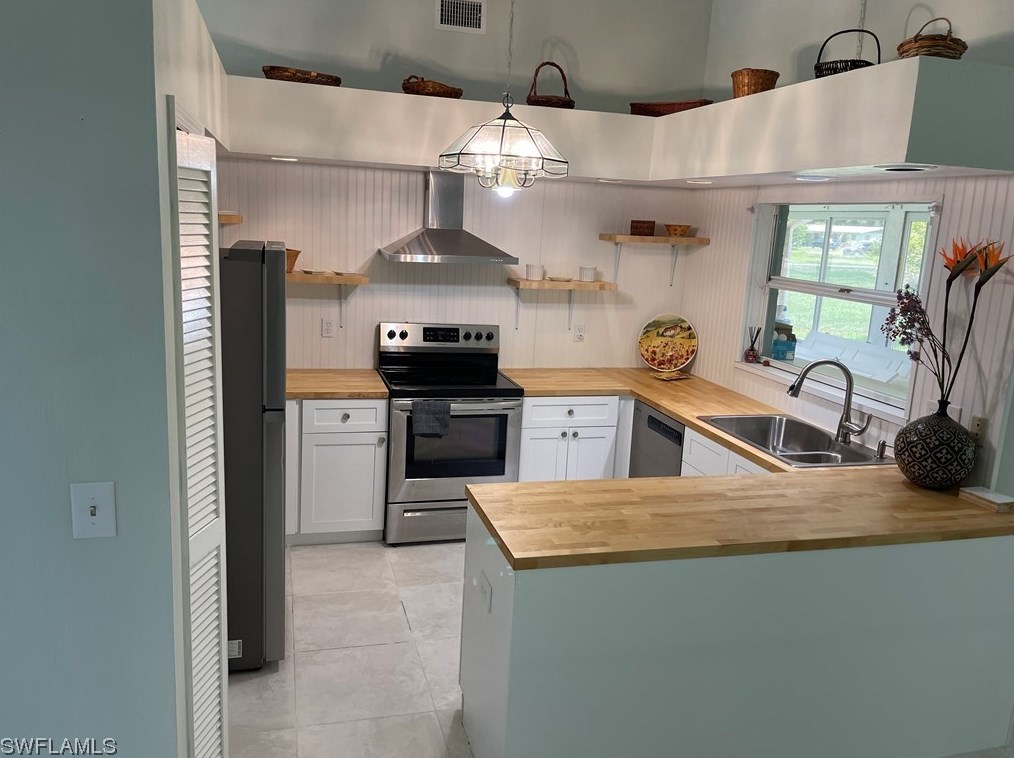 1002 Leeland Heights Blvd E, Lehigh Acres, FL 33936