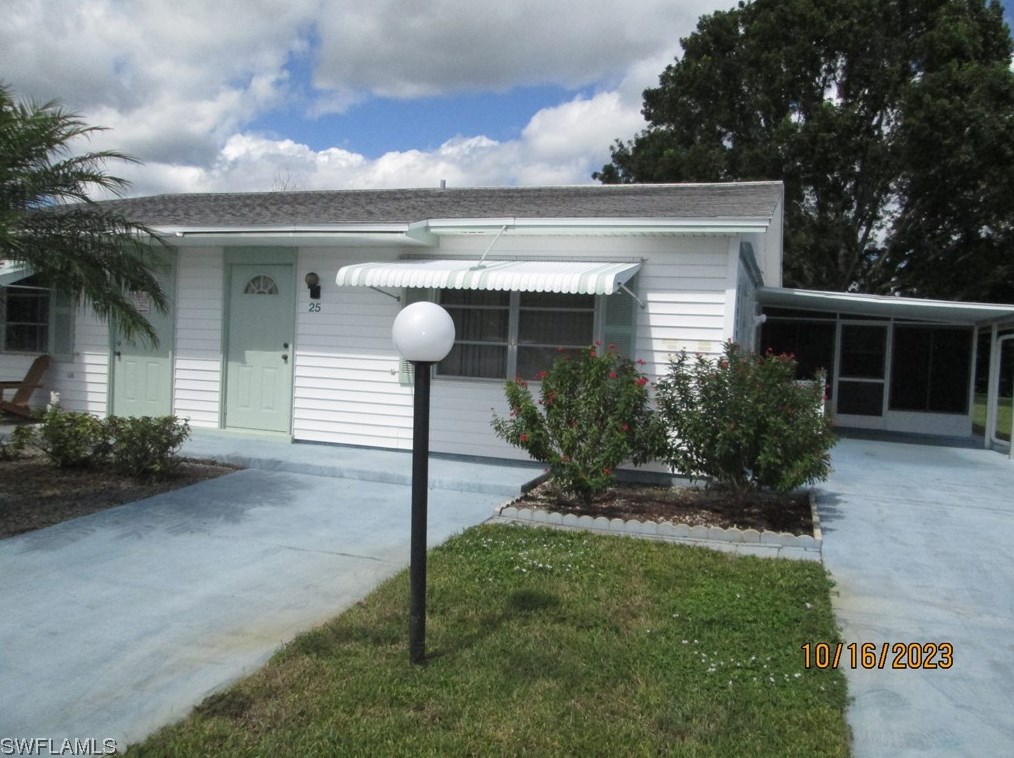 25 Dawn Flower Cir, Lehigh Acres, FL 33936