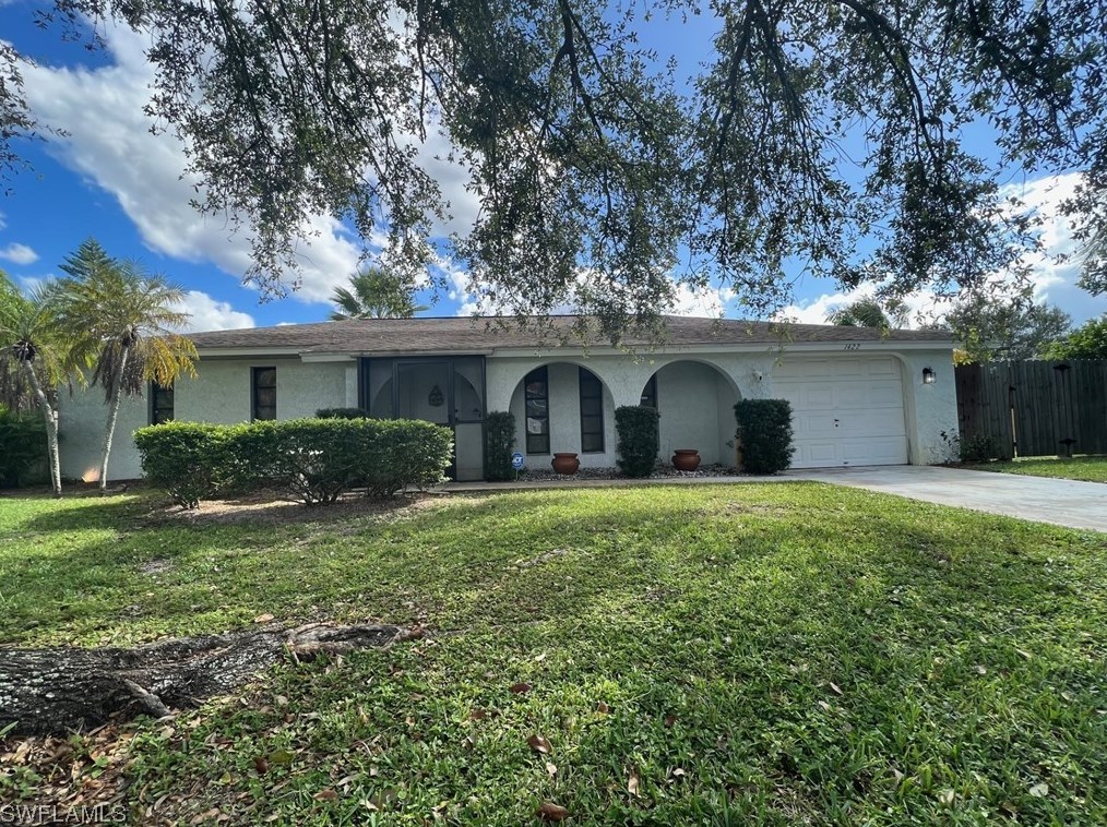 1422 Caywood Cir S, Lehigh Acres, FL 33936