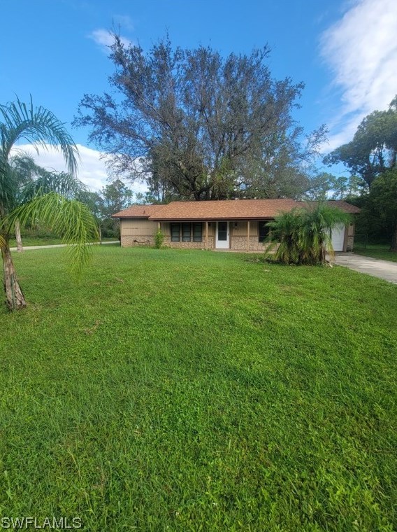 907 Avery St, Lehigh Acres, FL 33974