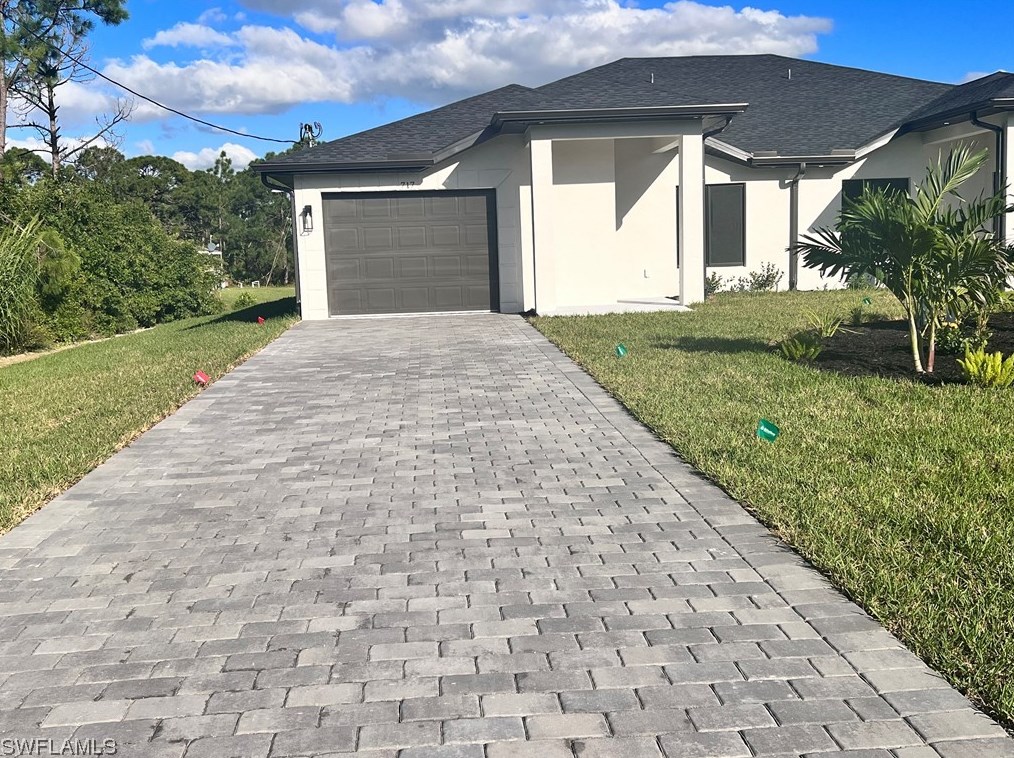 717-719 Eisenhower Blvd, Lehigh Acres, FL 33974