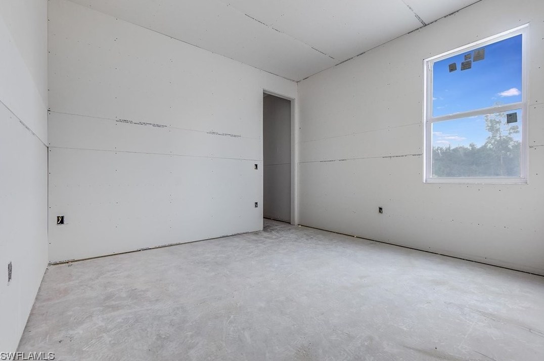 183 Beckley Dr, Lehigh Acres FL 33974-9702 exterior