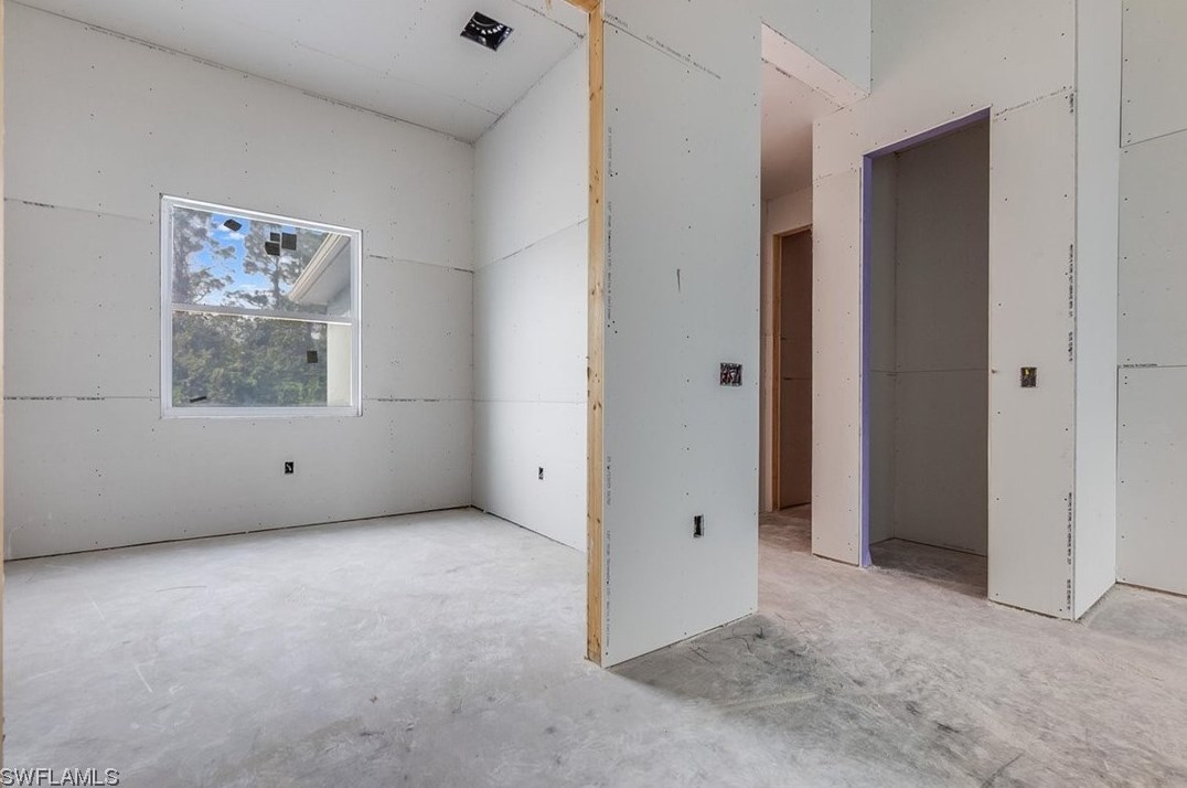 183 Beckley Dr, Lehigh Acres FL 33974-9702 exterior