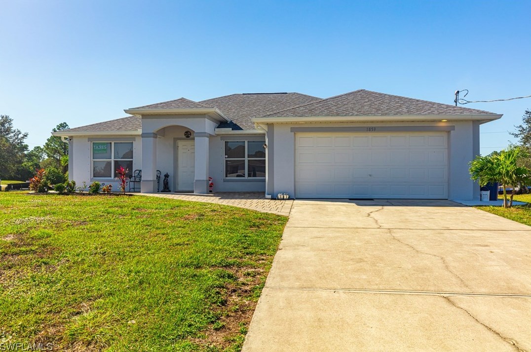 1859 Mayberry Dr, Lehigh Acres, FL 33972-1077