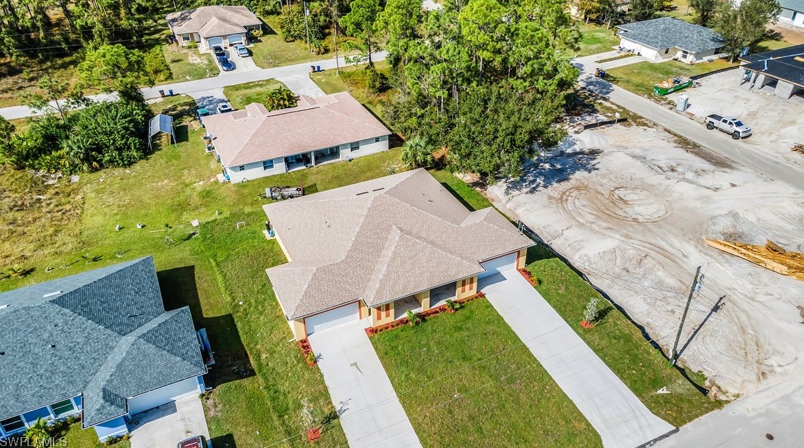 2118-2120 Zaharihas Dr, Lehigh Acres, FL 33973