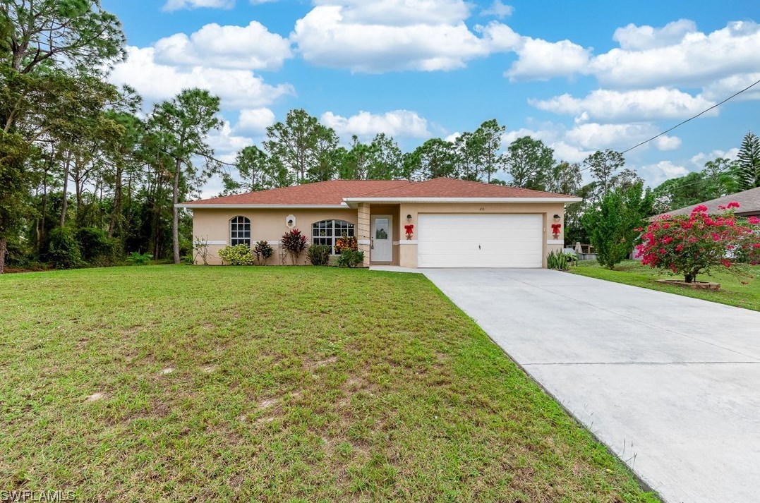 436 Broadmoor St, Lehigh Acres, FL 33974-9687