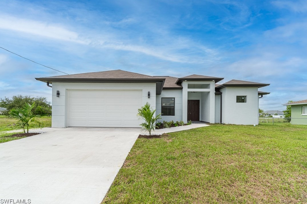 363 Ranier Ave, Lehigh Acres, FL 33974-2424