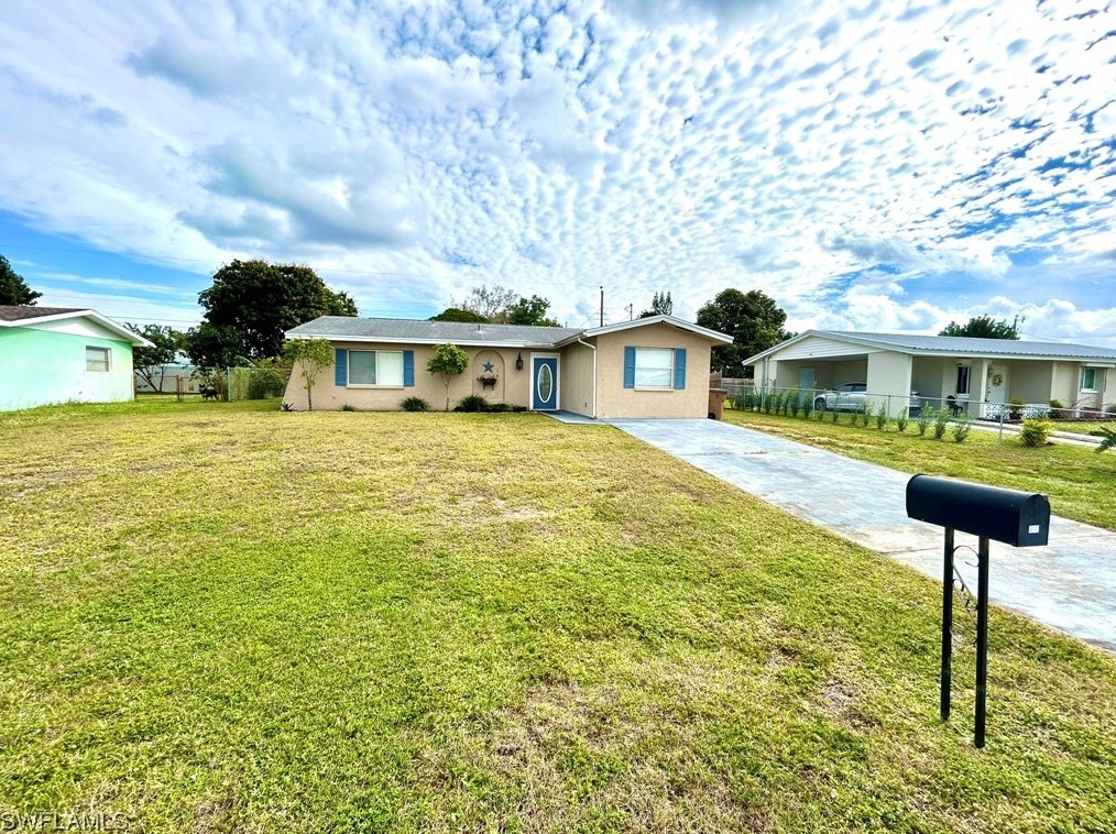 310 Morgan Cir, Lehigh Acres, FL 33936-7134