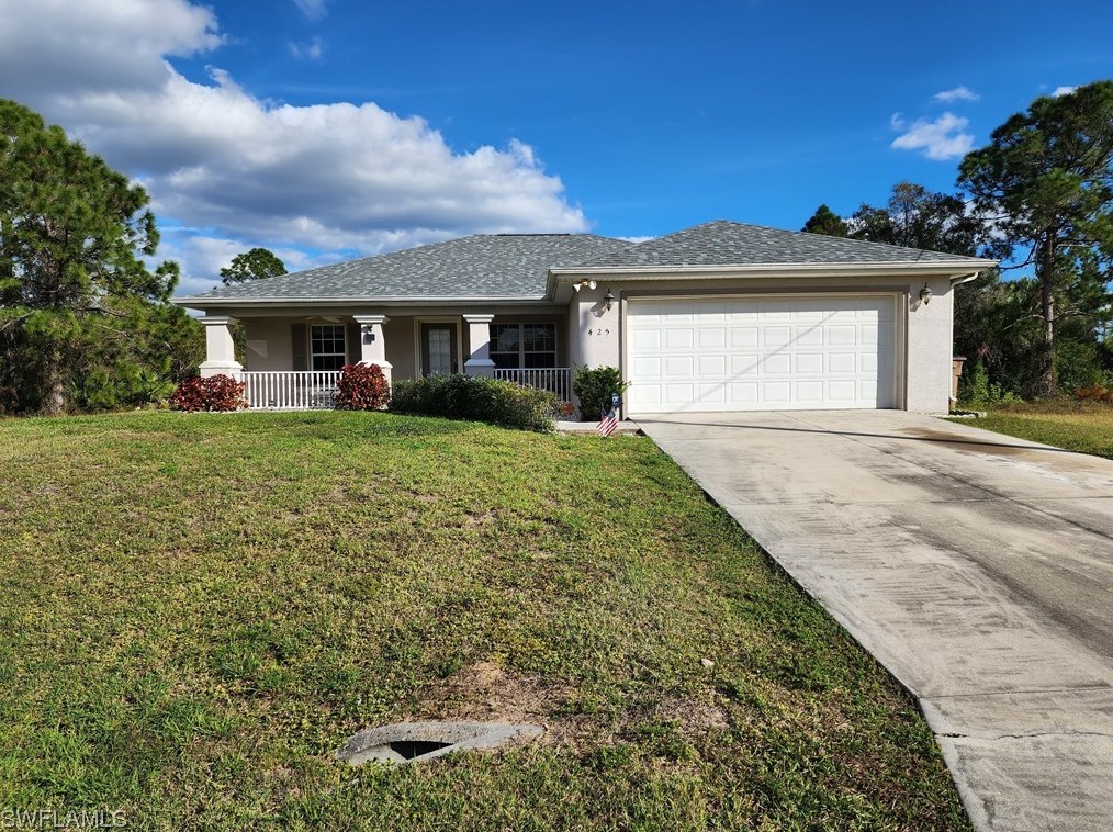 425 Gray Ave S, Lehigh Acres, FL 33974