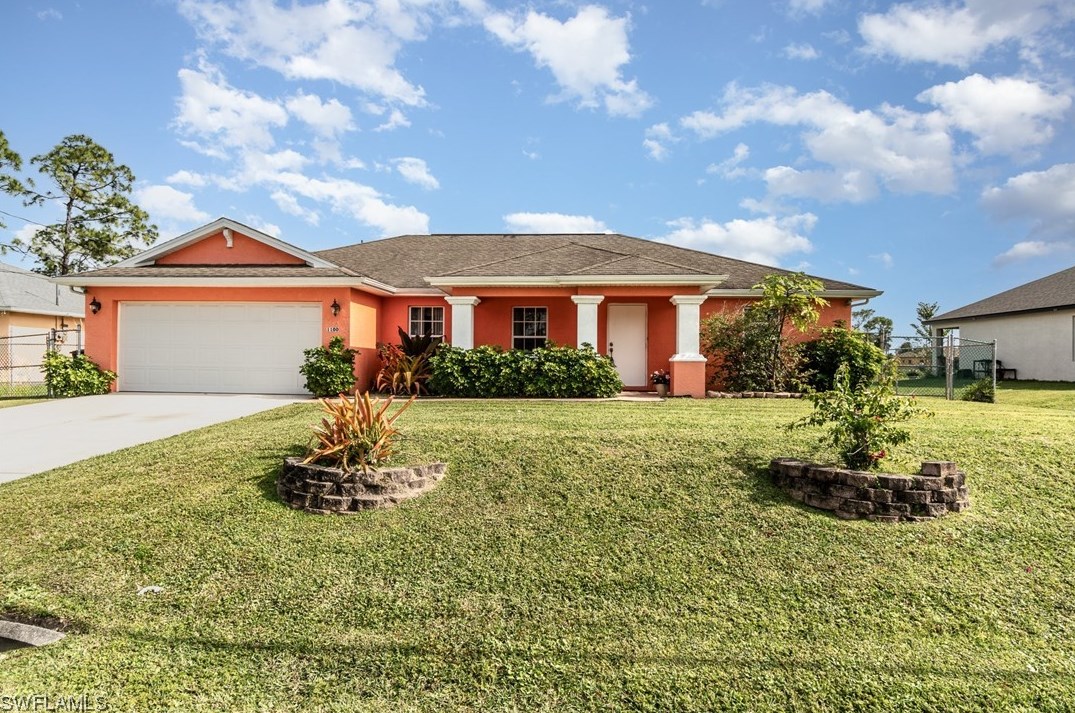 1100 Alaska Ave, Lehigh Acres, FL 33971-6450