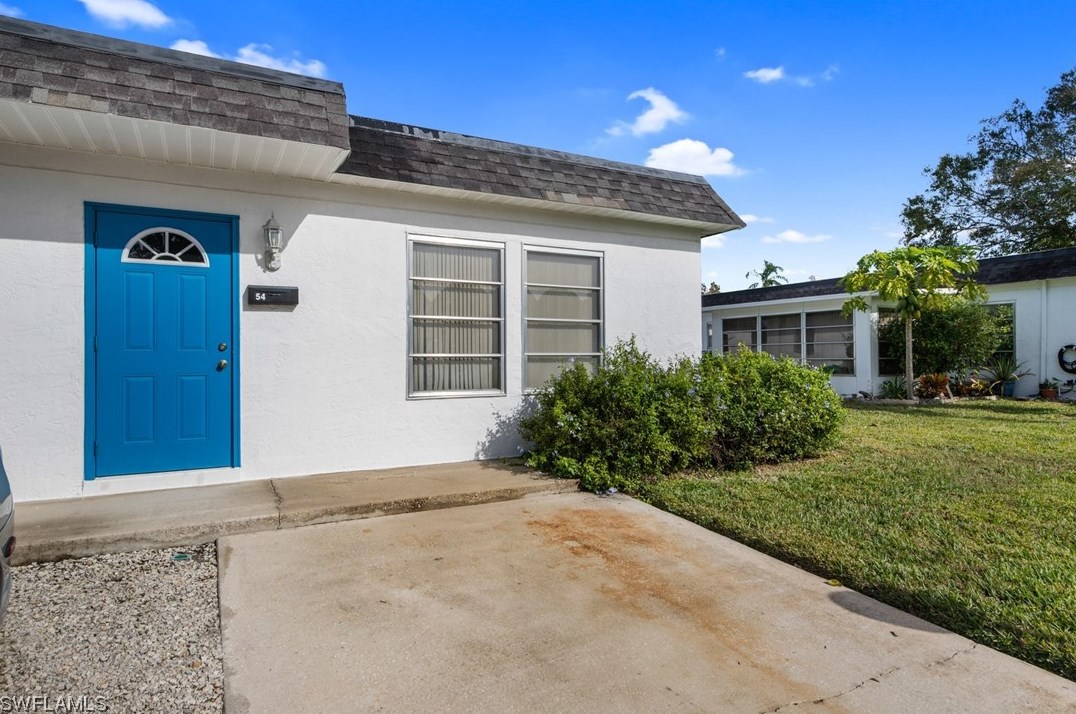 54 Temple Ct, Lehigh Acres, FL 33936-7230