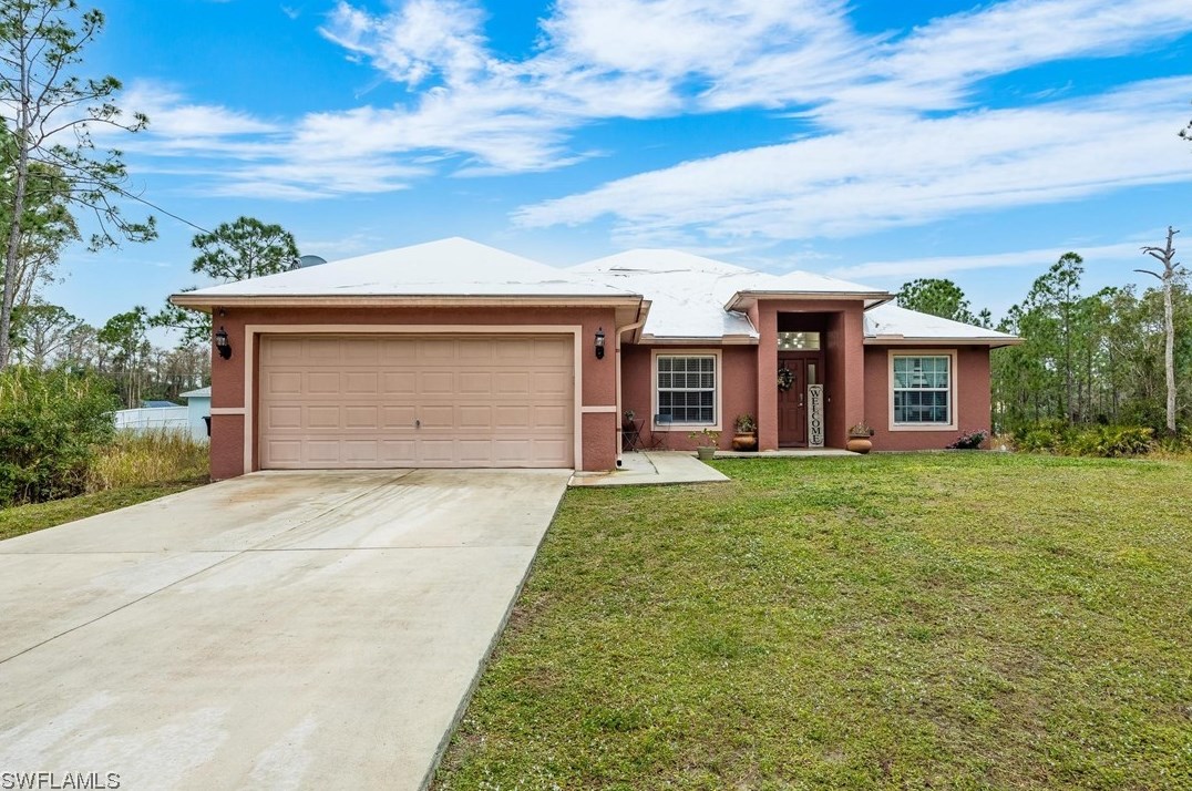 850 Fullerton Ave, Lehigh Acres, FL 33974-5563