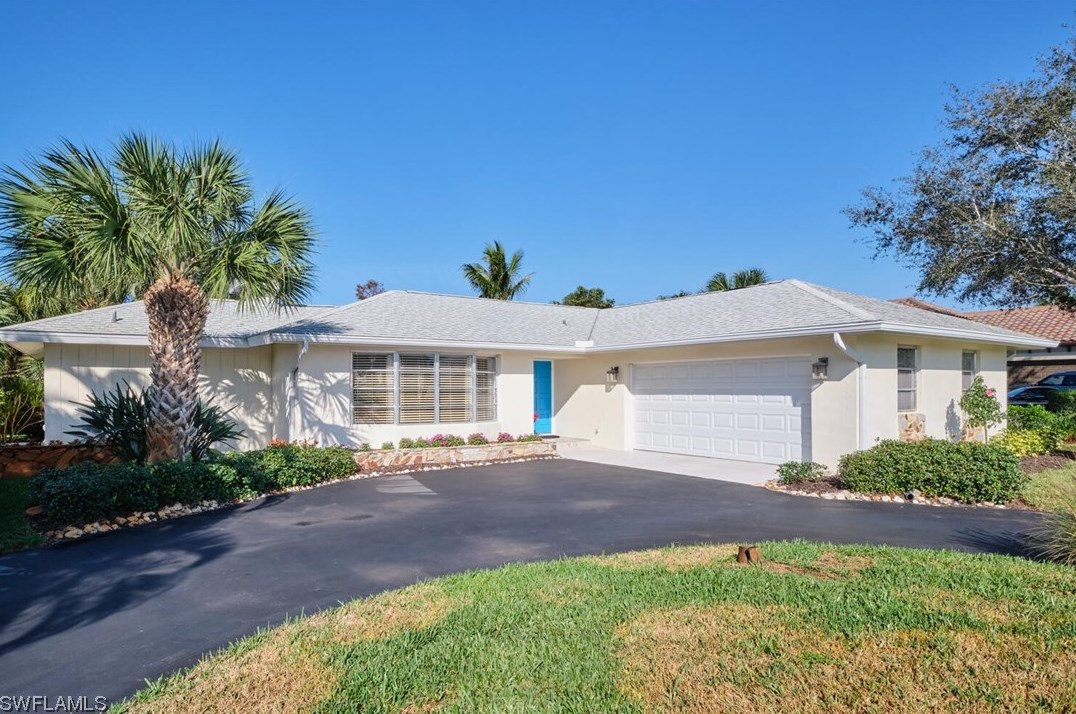 303 Cypress Way W, Naples, FL 34110