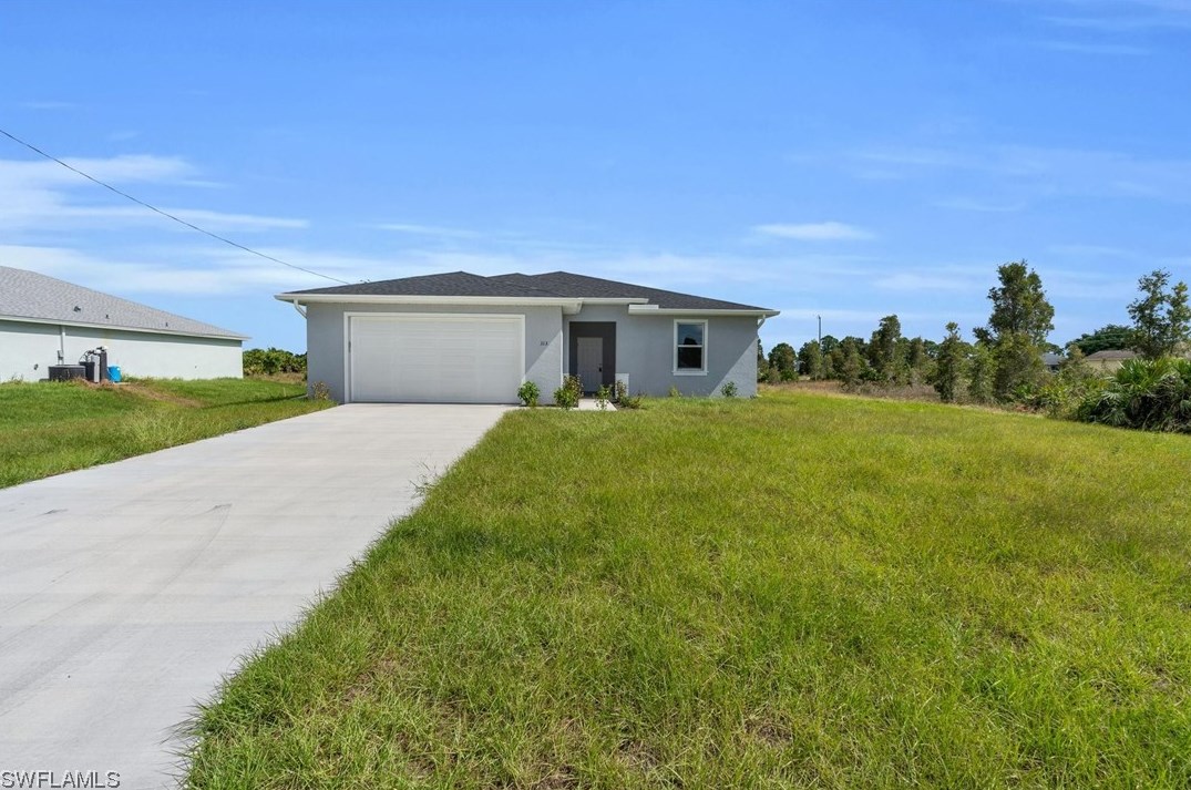 157 Peerless St, Lehigh Acres, FL 33974-9456