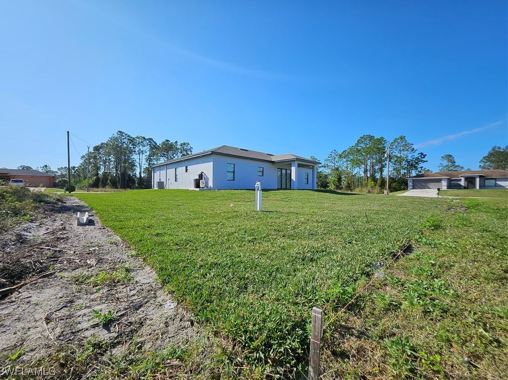 651 Keller St, Lehigh Acres FL 33974-7560 exterior