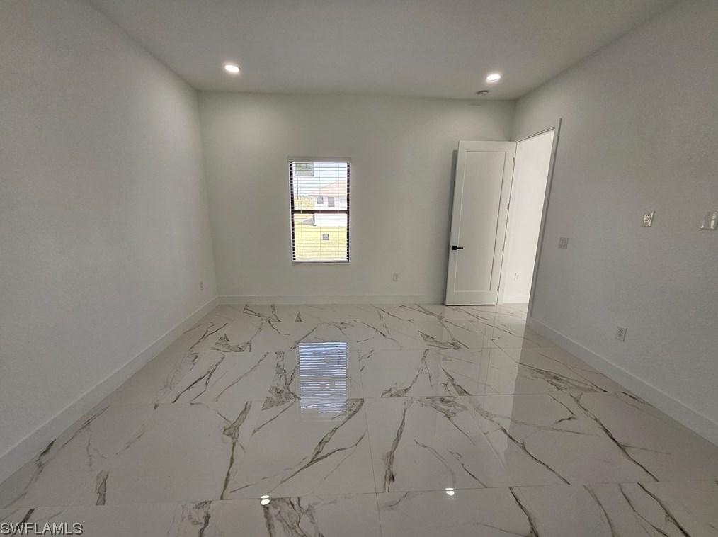 651 Keller St, Lehigh Acres FL 33974-7560 exterior