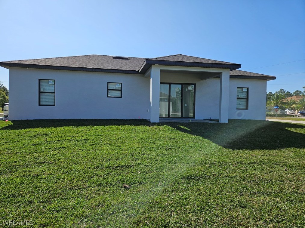 651 Keller St, Lehigh Acres FL 33974-7560 exterior