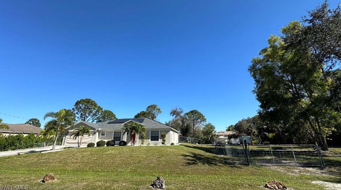 1704 Dale Ave, Lehigh Acres, FL 33971-7518