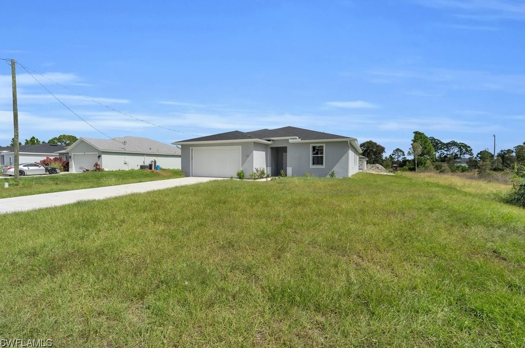 329 Peerless St, Lehigh Acres, FL 33974-9440
