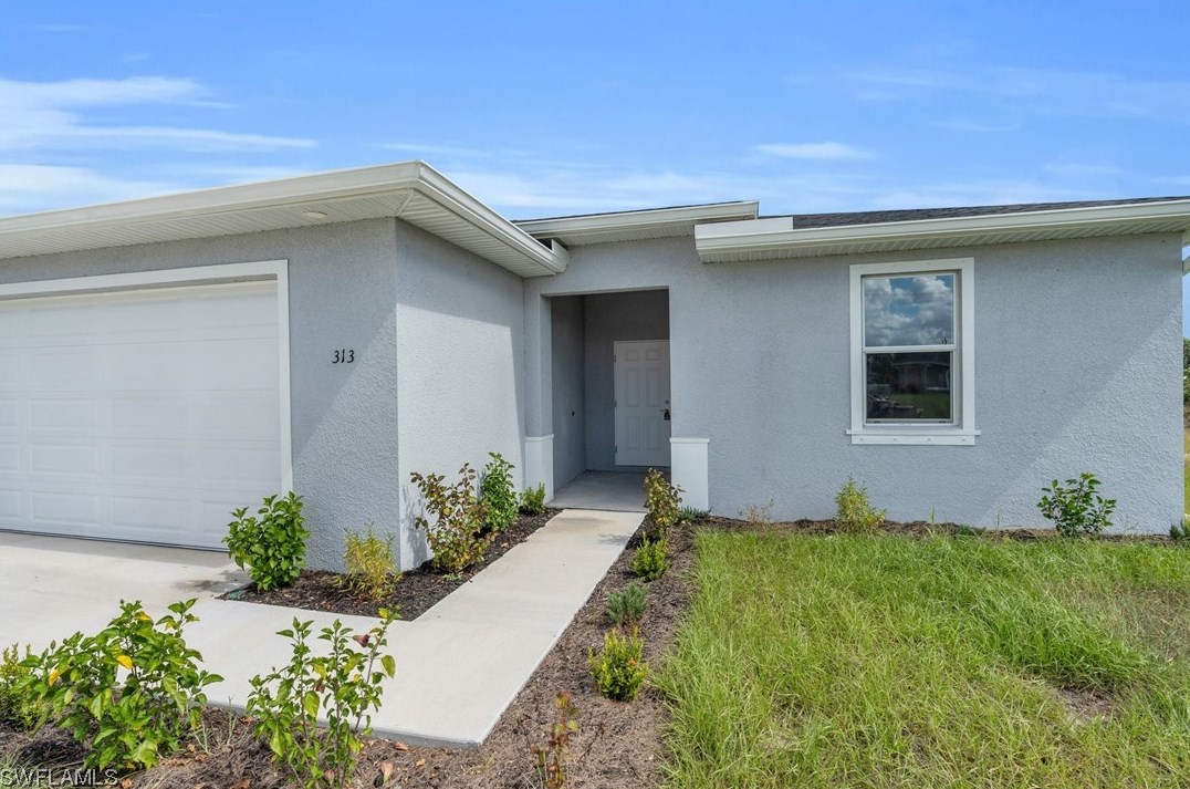 329 Peerless St, Lehigh Acres FL 33974-9440 exterior