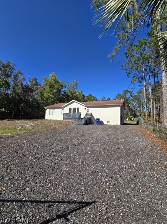 627 Delmonico St, Lehigh Acres, FL 33974-0526
