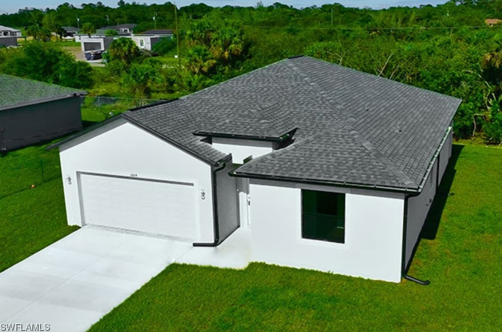 566 Woodview Dr, Lehigh Acres, FL 33972-1086