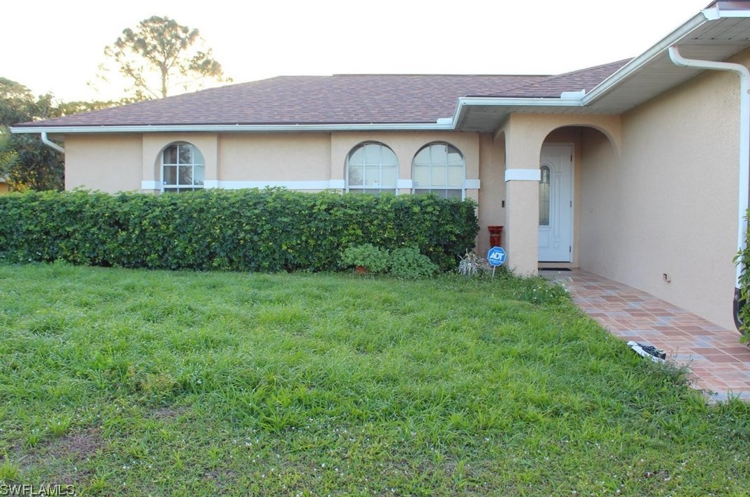 105 Tena Ave, Lehigh Acres, FL 33971-1803