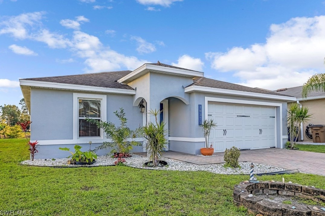 10372 Canal Brook Ln, Lehigh Acres, FL 33936-6653