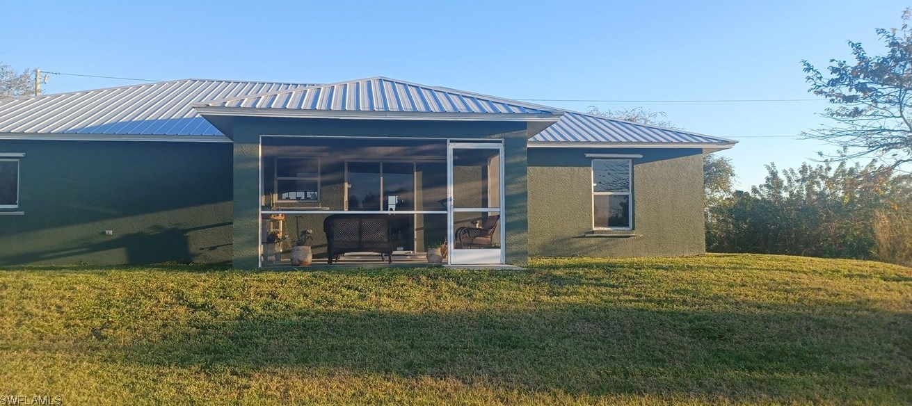 185 Pennfield St, Lehigh Acres, FL 33974-9497