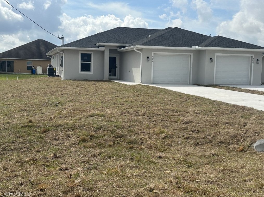 400-402 Grant Blvd, Lehigh Acres, FL 33974