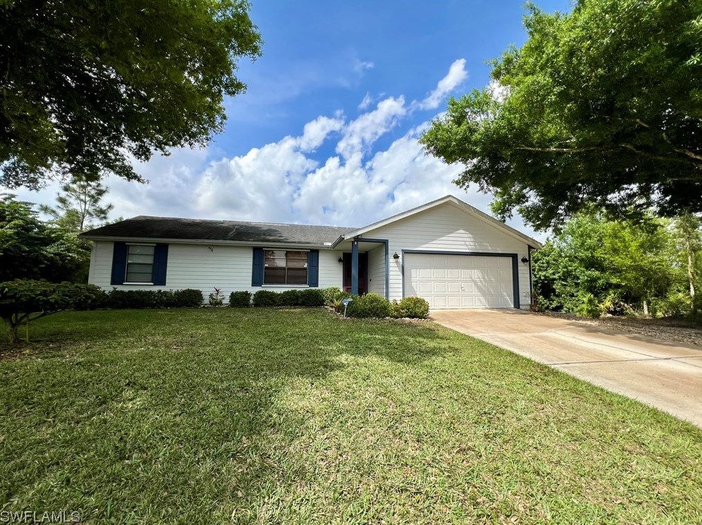 919 Robert Ave, Lehigh Acres, FL 33936