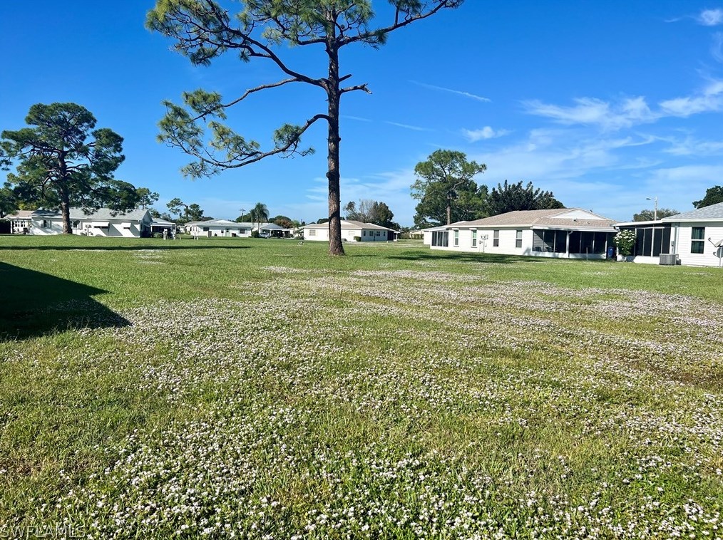 18 Pinewood Blvd, Lehigh Acres FL  33936-7304 exterior