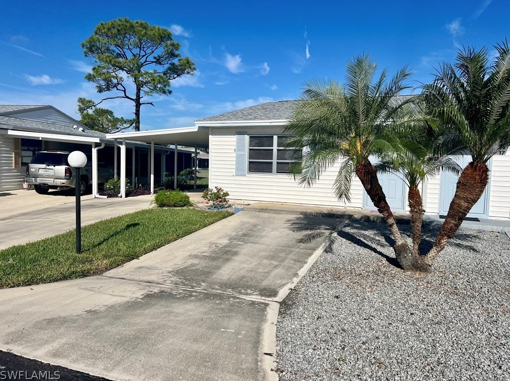 18 Pinewood Blvd, Lehigh Acres FL  33936-7304 exterior