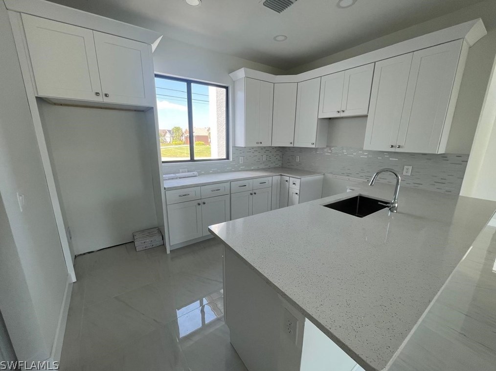 1102 12th Ter, Cape Coral, FL 33909-1444