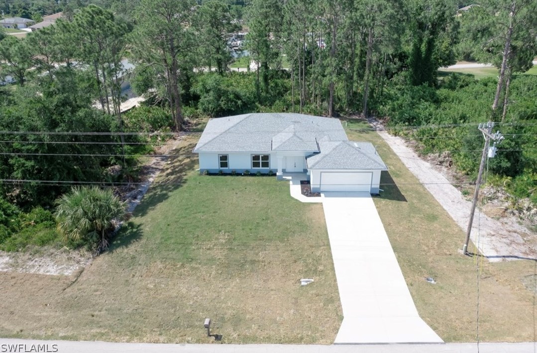 839 Sunrise Blvd, Lehigh Acres, FL 33974-9718
