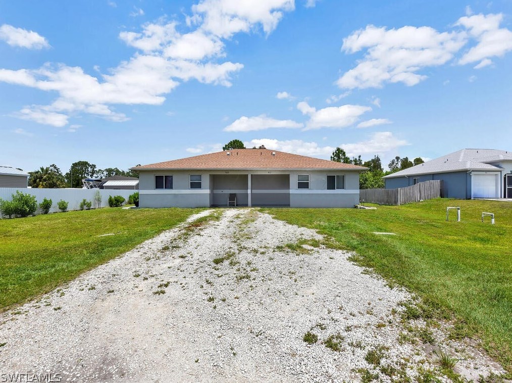 909 Jaguar Blvd, Lehigh Acres, FL 33974-1722
