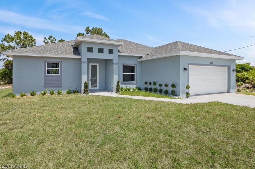 865 Chicago Street E, Lehigh Acres, FL 33974