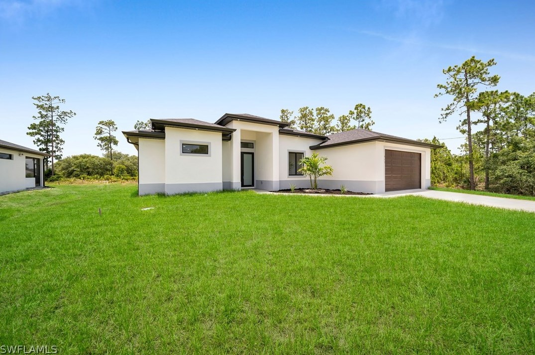 817 Calvin Ave, Lehigh Acres FL  33972-7213 exterior