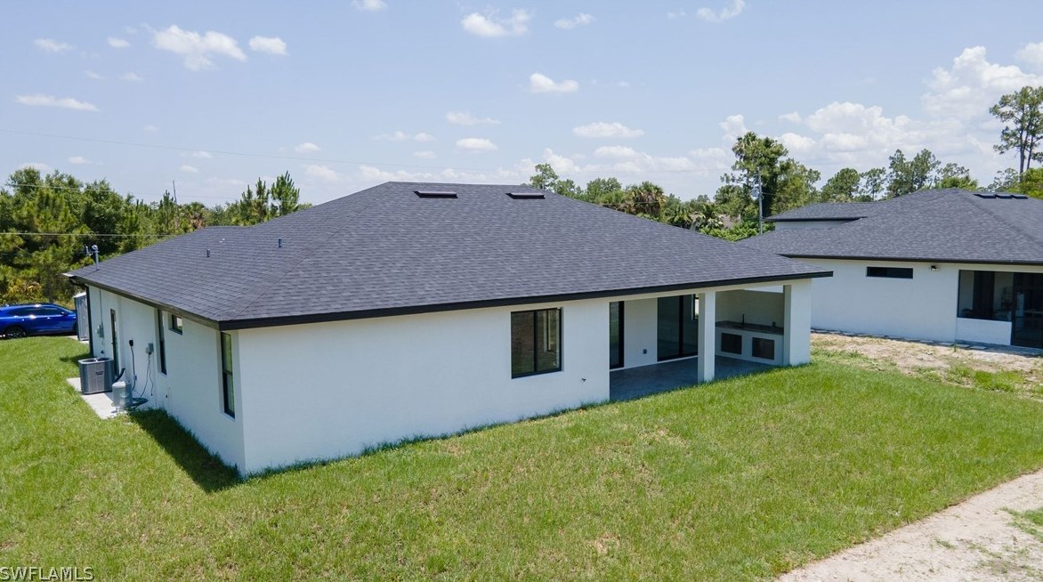 817 Calvin Ave, Lehigh Acres FL  33972-7213 exterior