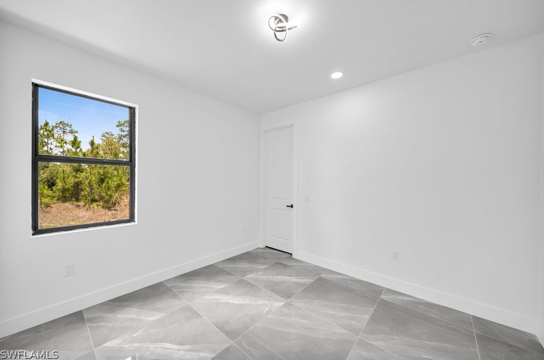 817 Calvin Ave, Lehigh Acres FL  33972-7213 exterior