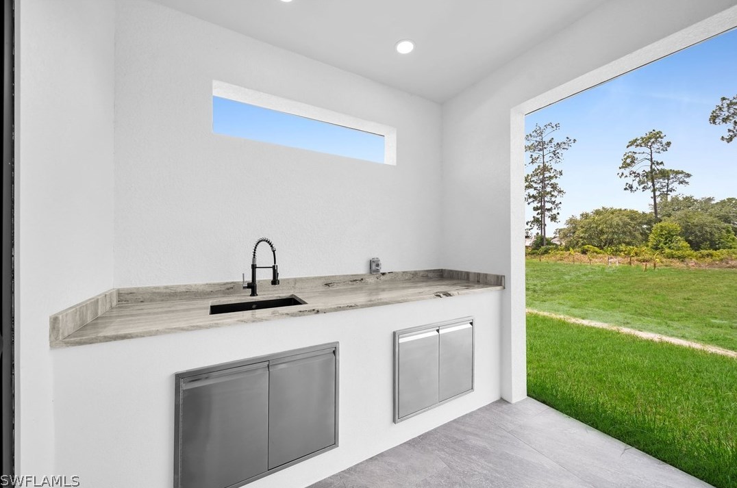 817 Calvin Ave, Lehigh Acres FL  33972-7213 exterior