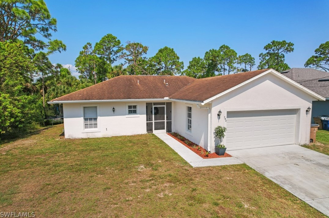 740 Oro Ave, Lehigh Acres, FL 33974-5502