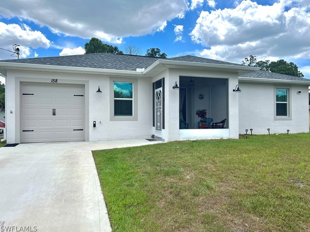 158 Thornton Ave, Lehigh Acres, FL 33974-7124