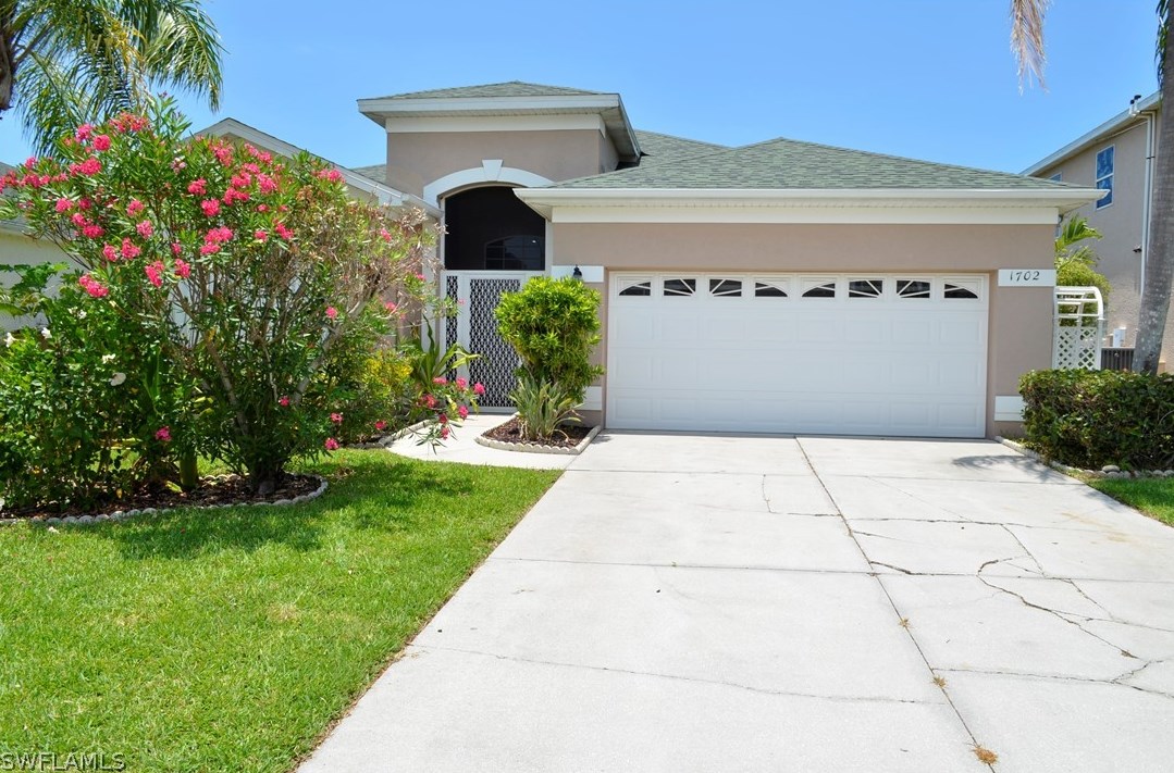 1702 Emerald Cove Dr, Cape Coral, FL 33991-3498