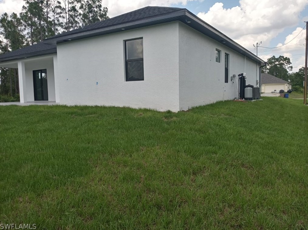 810 Homestead Rd, Lehigh Acres FL 33974-7600 exterior
