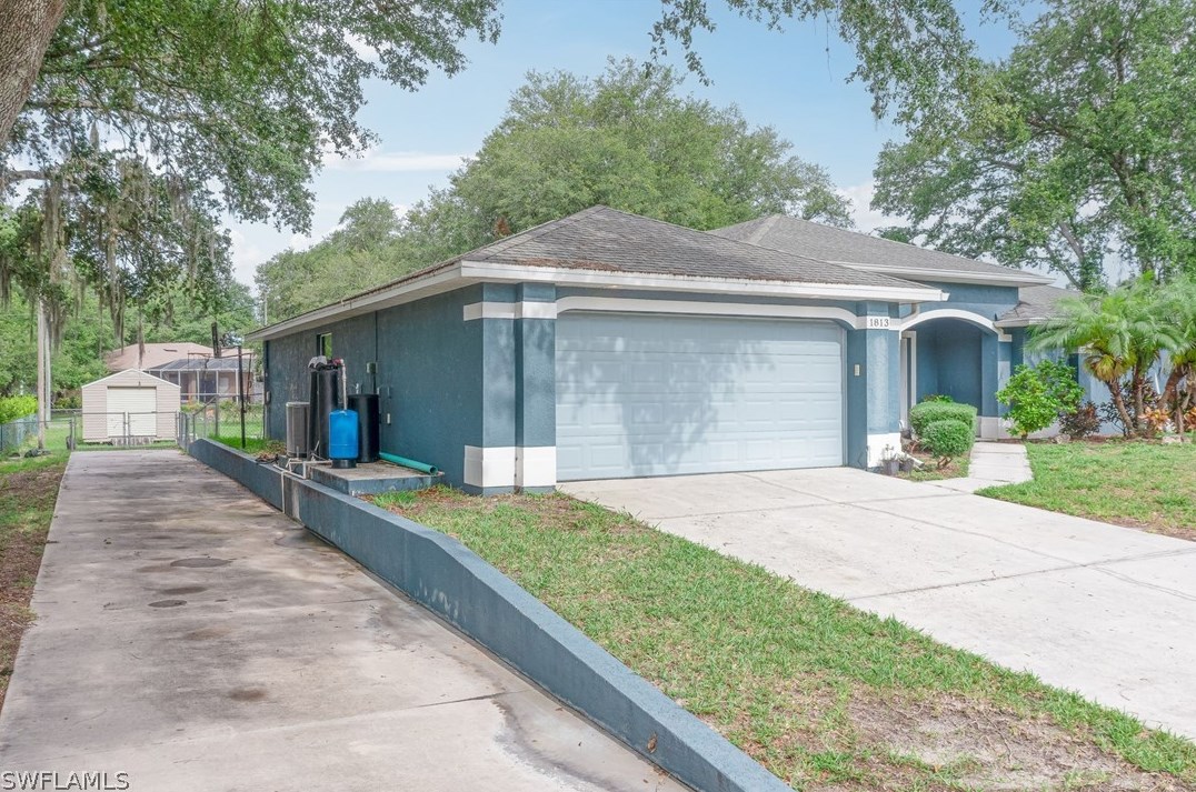 1813 Jackson Ave, Lehigh Acres FL 33972-2523 exterior