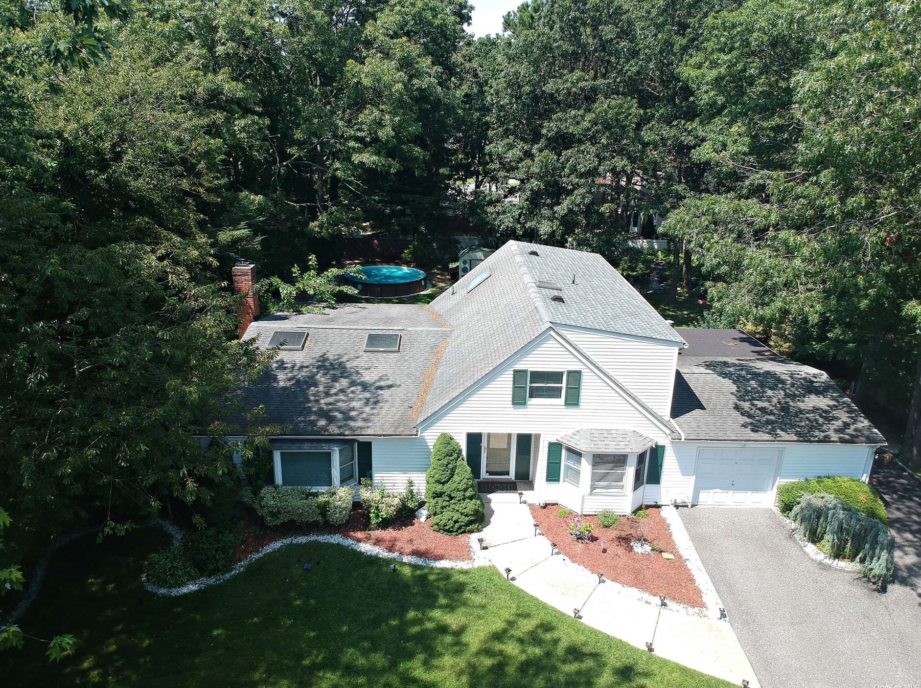 7 Coed Ln, Farmingville, NY 11738-2201